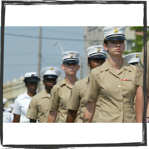 Women military officers march single-file